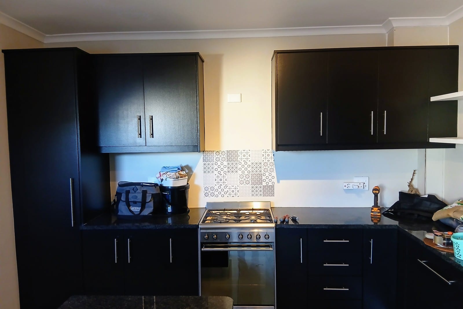 The same Macassar cupboards finished in a uniform dark coat