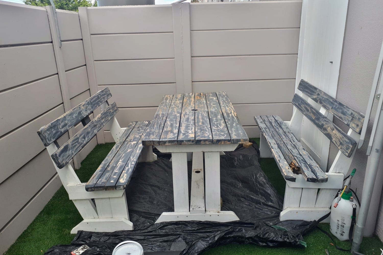 Garden table and benches in Somerset West sanded back to bare wood in patches